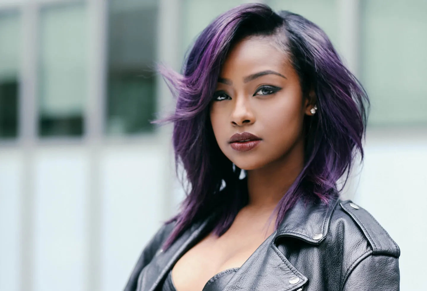 Justine Skye wearing purple Couture Body Wave hair